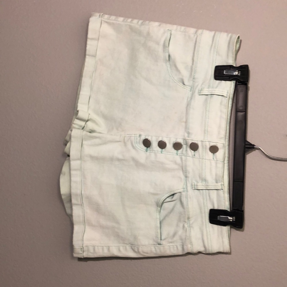 High waisted light green shorts
